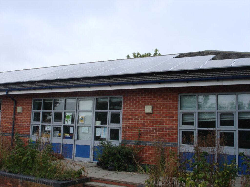 Larkrise Primary School rooftop solar PV panels, community owned and operated by Low Carbon Hub, Oxfordshire