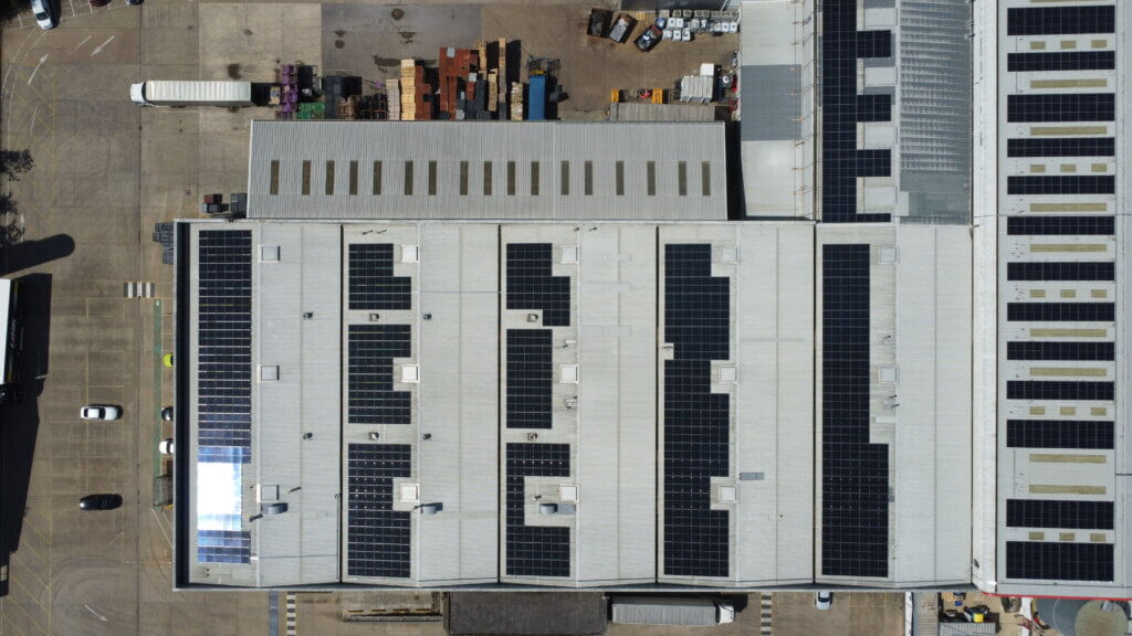 Image showing large industrial roof with solar panels